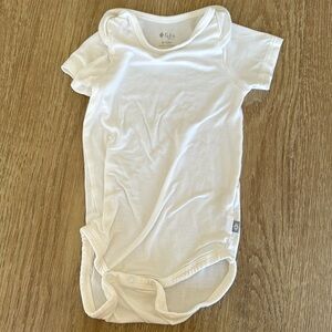 NWOT Kyte Baby 6-12 months white onesie